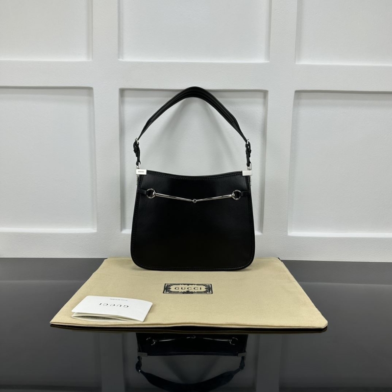 G*u*i top handle bags